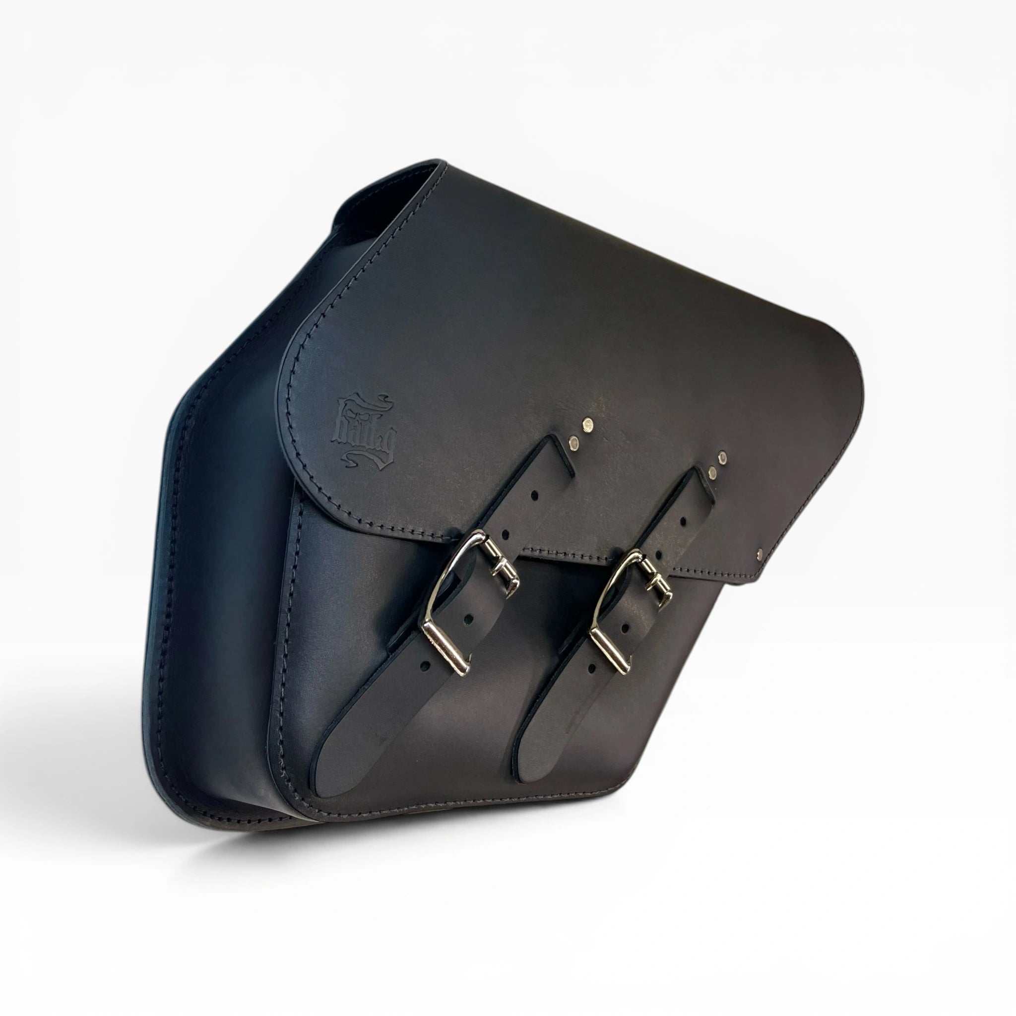 A black leather saddle bag with two silver buckle straps, shown at an angle on a clean white background.