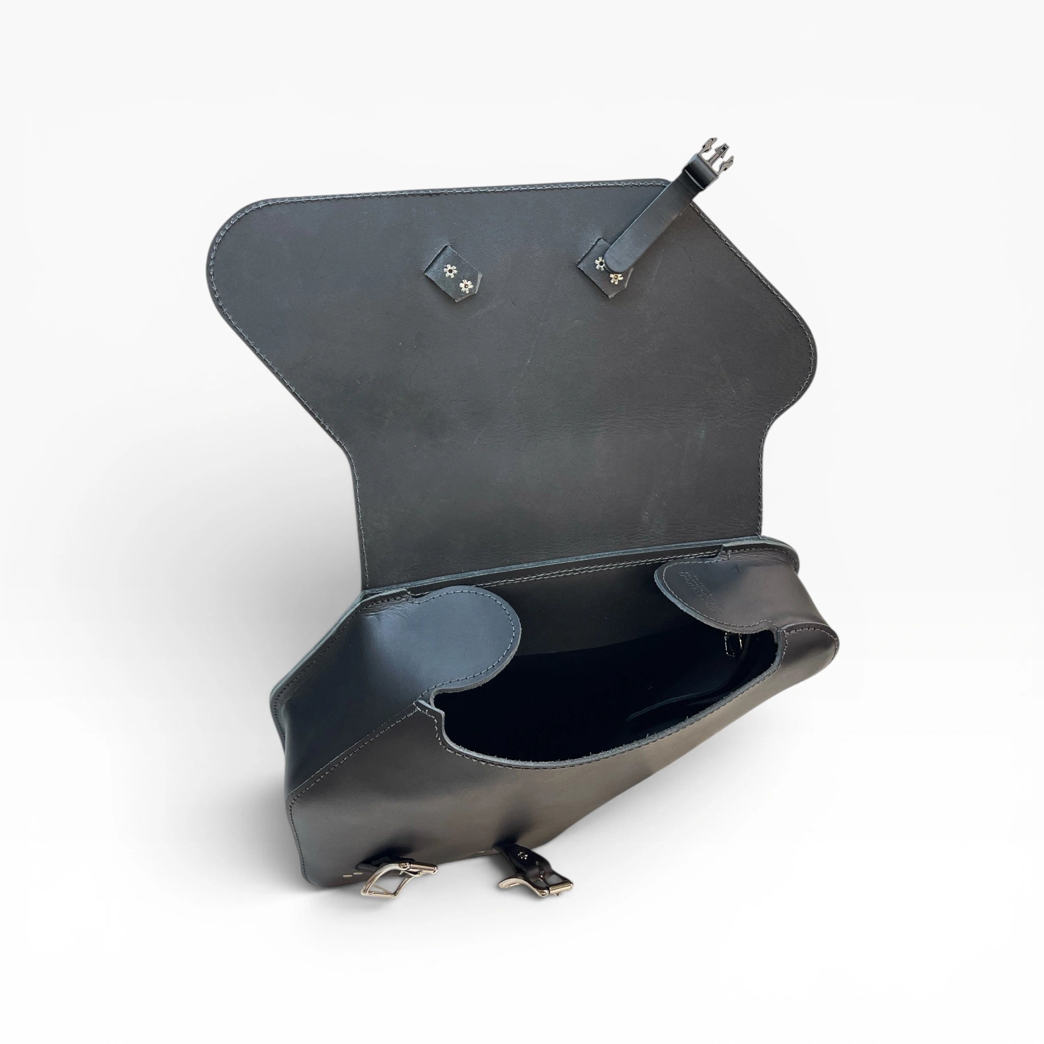 A dark gray leather clutch bag shown open, displaying its interior compartments, strap attachments, and silver-tone metal hardware against a clean white background.